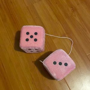 Light pink fuzzy dice